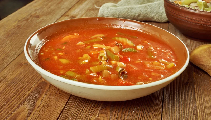 Peperoni con pomodori pelati