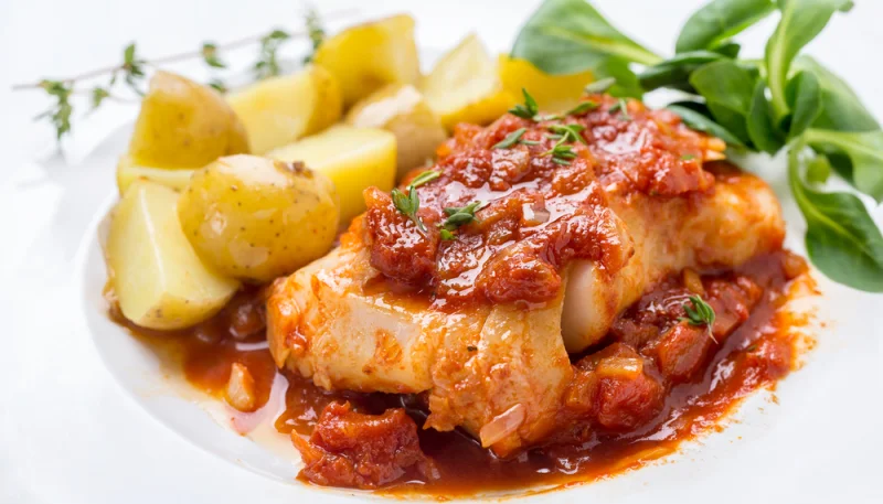 Filetti di merluzzo in bagno di pomodori