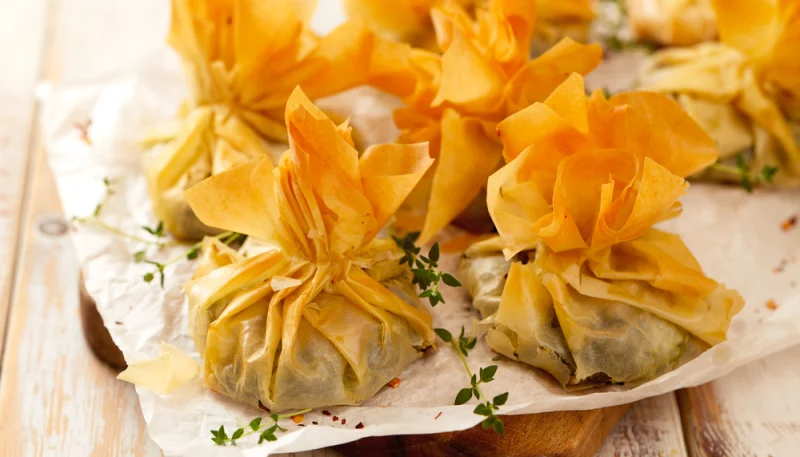 Fagottini con mela e salsiccia