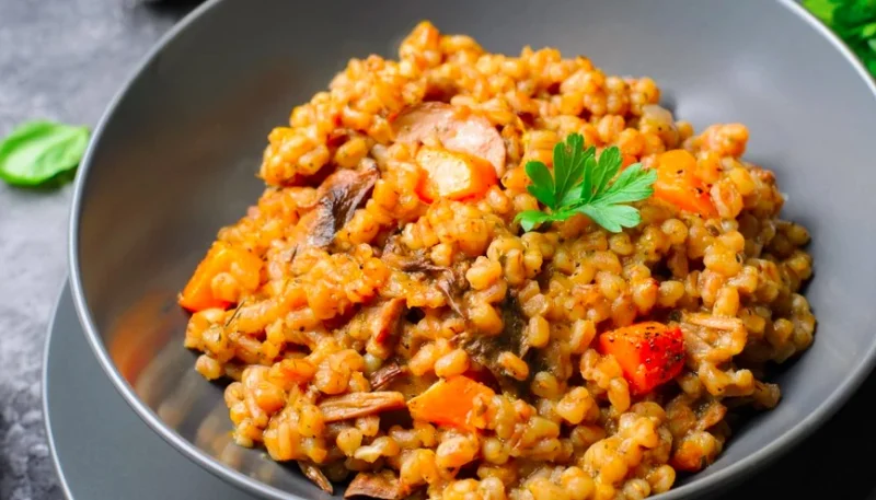 Risotto di farro con zucca e funghi