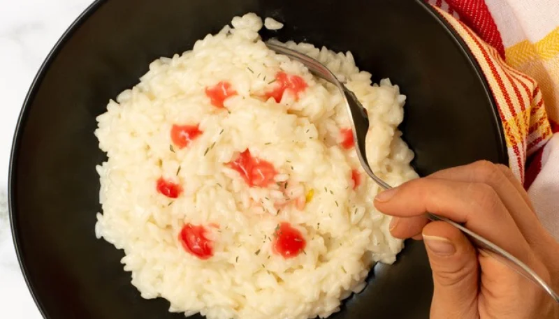 Riso con salsa di melograno